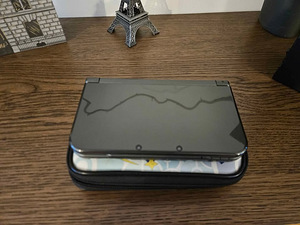 New Nintendo 3ds xl Metalic black + pokemon ümbris (2 foto / 3)