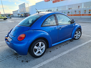 Volkswagen New Beetle (11 foto / 14)