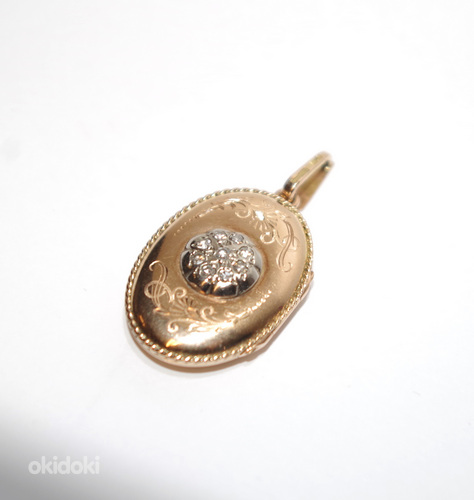 Kullast ovaalne medaljon teemantidega 585 proov 11.58 gr