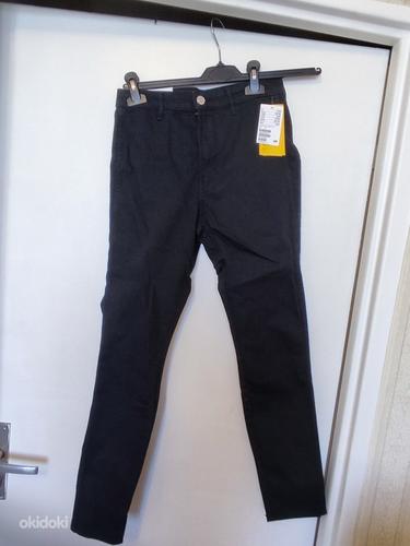 Новые чёрные женские джинсы (фото #1)