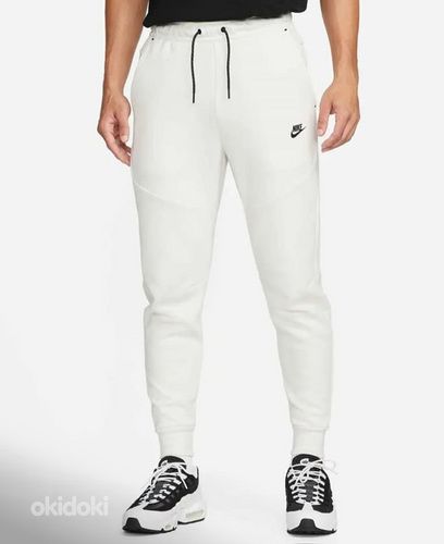 Новые спортивные штаны Nike Tech размера М. (фото #1)