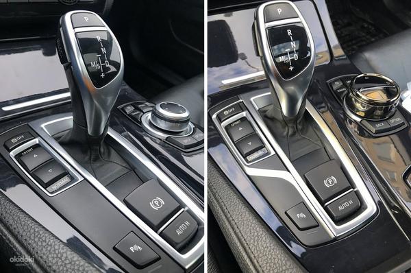 Jaunā BMW iDrive multimediju kontrolleru paplāksne (foto #1)
