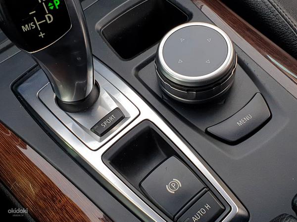 Jaunā BMW iDrive multimediju kontrolleru paplāksne (foto #10)