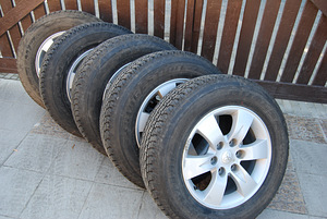 Bridgestone 245/65R17 + Mitsubishi valuveljed 5tk (nagu uus) (1 foto / 2)
