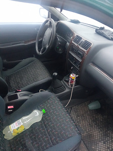 Mazda 323 (2 foto / 5)