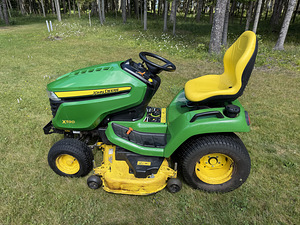 John Deere X590 koos järelkäruga (2 foto / 6)