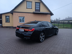 BMW 730xd 195kw M pac (6 foto / 8)