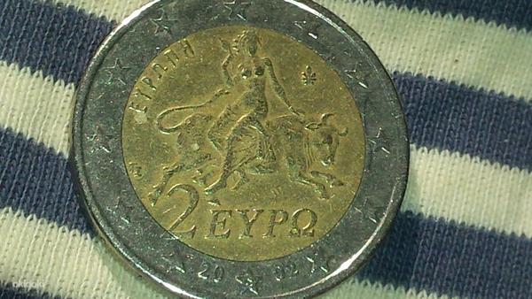 Монета номиналом 2 евро с дефектом (фото #4)