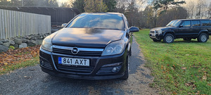 Opel Astra H (9 foto / 11)