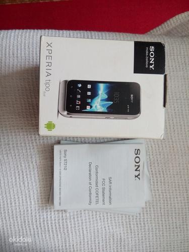 Смартфон Sony Xperia ST21i2 на 2 сим (фото #1)