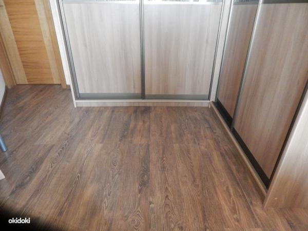 Laminaadi ja puitpõrandate kvaliteetne paigaldamine (foto #1)
