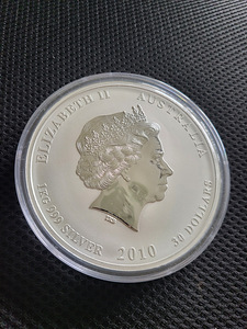 1 kg hõbemünt (2x Austraalia, 1x UK, 1x Cooki saared) (3 foto / 9)