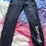 Темно-синие спортивные брюки с карманами для мальчиков, размер 170 см. (фото #1)