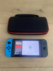 Nintendo Switch V2 с чехлом (1 фото из 1)