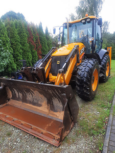 Погрузчик-экскаватор JCB 4CX (7 фото из 7)
