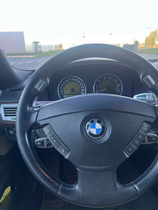 BMW 740i (7 foto / 15)