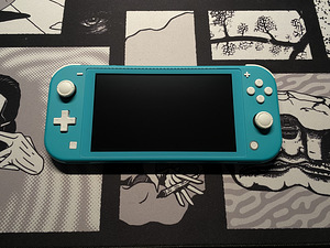 Nintendo Switch Lite + 32 ГБ SD (2 фото из 4)