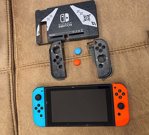 Nintendo Switch + Animal Crossing: New Horizons (5 foto / 6)