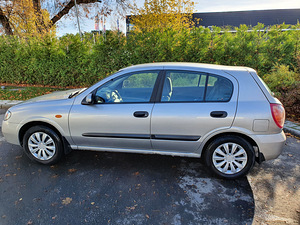 Nissan Almera N16 (1 foto / 15)