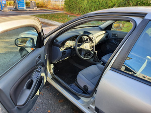 Nissan Almera N16 (9 foto / 15)