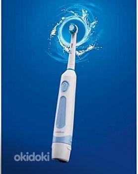 Nevadent Electric toothbrush with 4 brush новая в упаковке (фото #1)