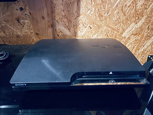 Sony Playstation 3 Slim 320GB с 2 контроллерами + 6 игр (5 фото из 8)