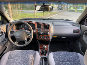 Nissan Primera (9 foto / 9)
