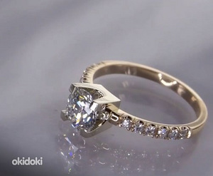 Olemas sertifikaat 18K gold, üks suur teemat ja 12 väikest t (1 foto / 4)