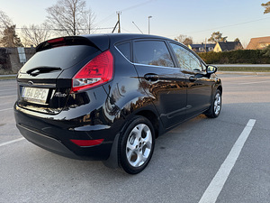 Ford Fiesta 1.6D, 2011a. (7 foto / 15)
