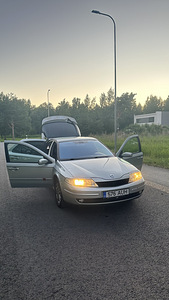 Рено Лагуна (11 фото из 15)