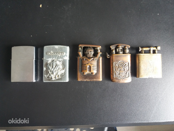 Бывшие в употреблении зажигалки Zippo