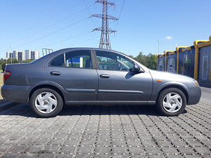 Nissan Almera 2005.1.5b (2 foto / 12)
