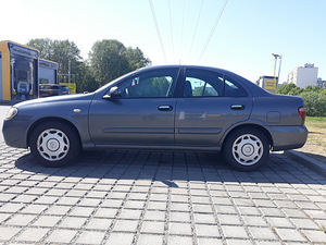 Nissan Almera 2005.1.5b (7 foto / 12)