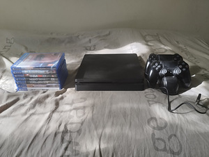 Playstation 4 500gb 2 pulti laadija ja mangud (1 foto / 2)