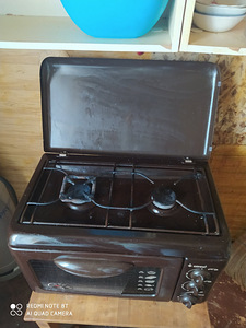 Продам настольную газовую печь с балоном (3 фото из 3)