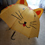 Kollane kassi vihmavari (foto #1)