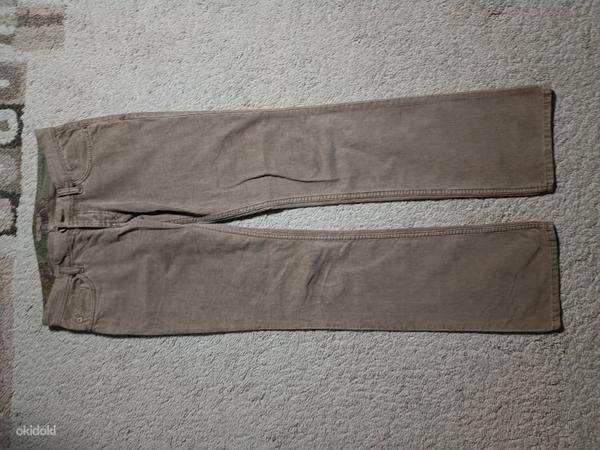 Расклешенные джинсы с низкой талией (фото #1)