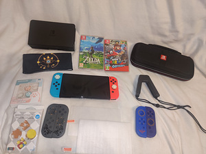 Nintendo Switch OLED+Чехол+Игры+Подарок (1 фото из 4)