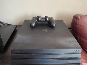 PS4 Pro 1TB (2 foto / 2)