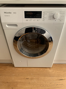 Katkine pesumasin Miele (1 foto / 3)